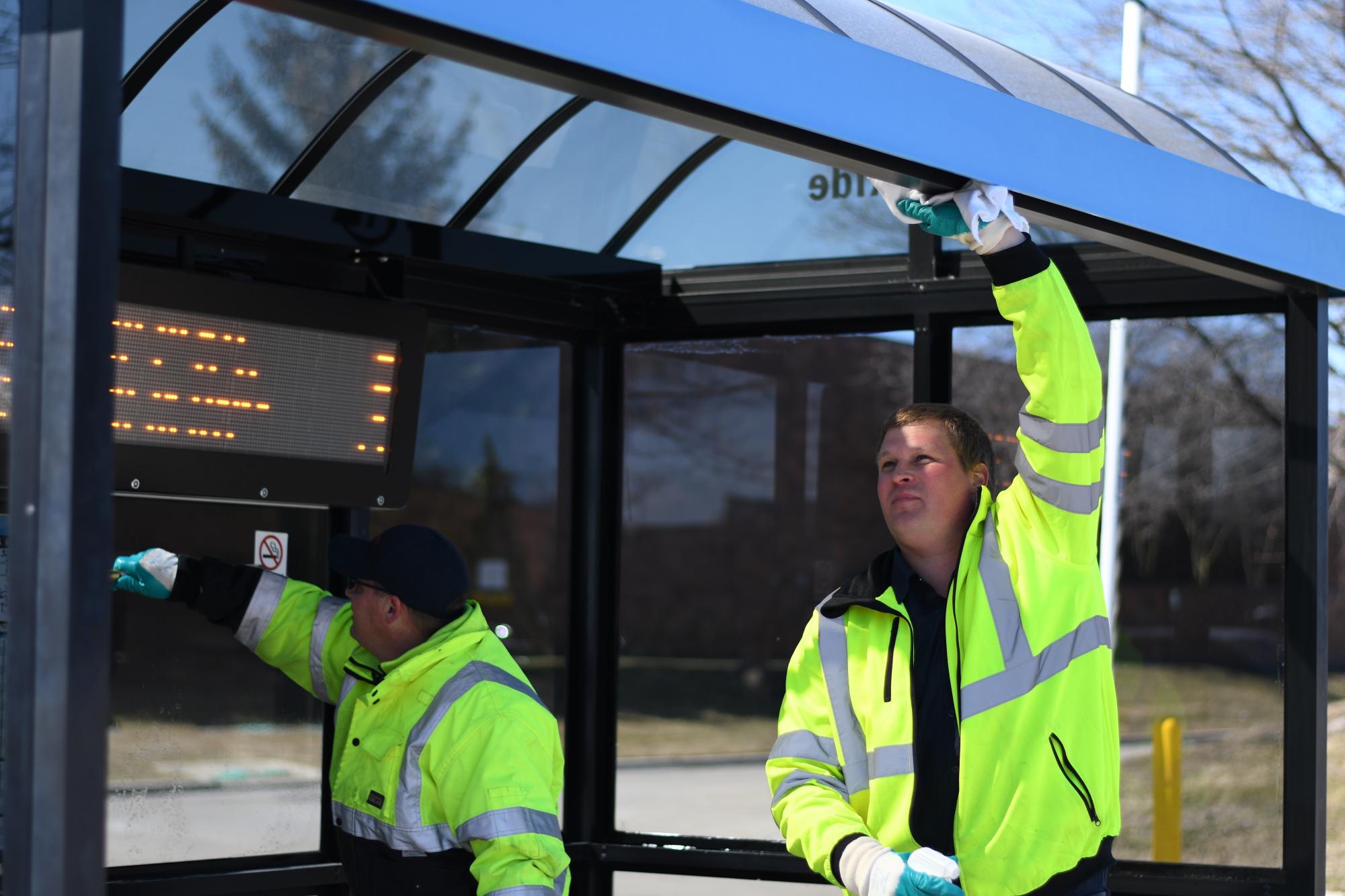 TheRide Facilities team cleans a bus shelter