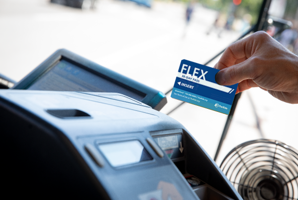 TheRide FlexPass being swiped through farebox