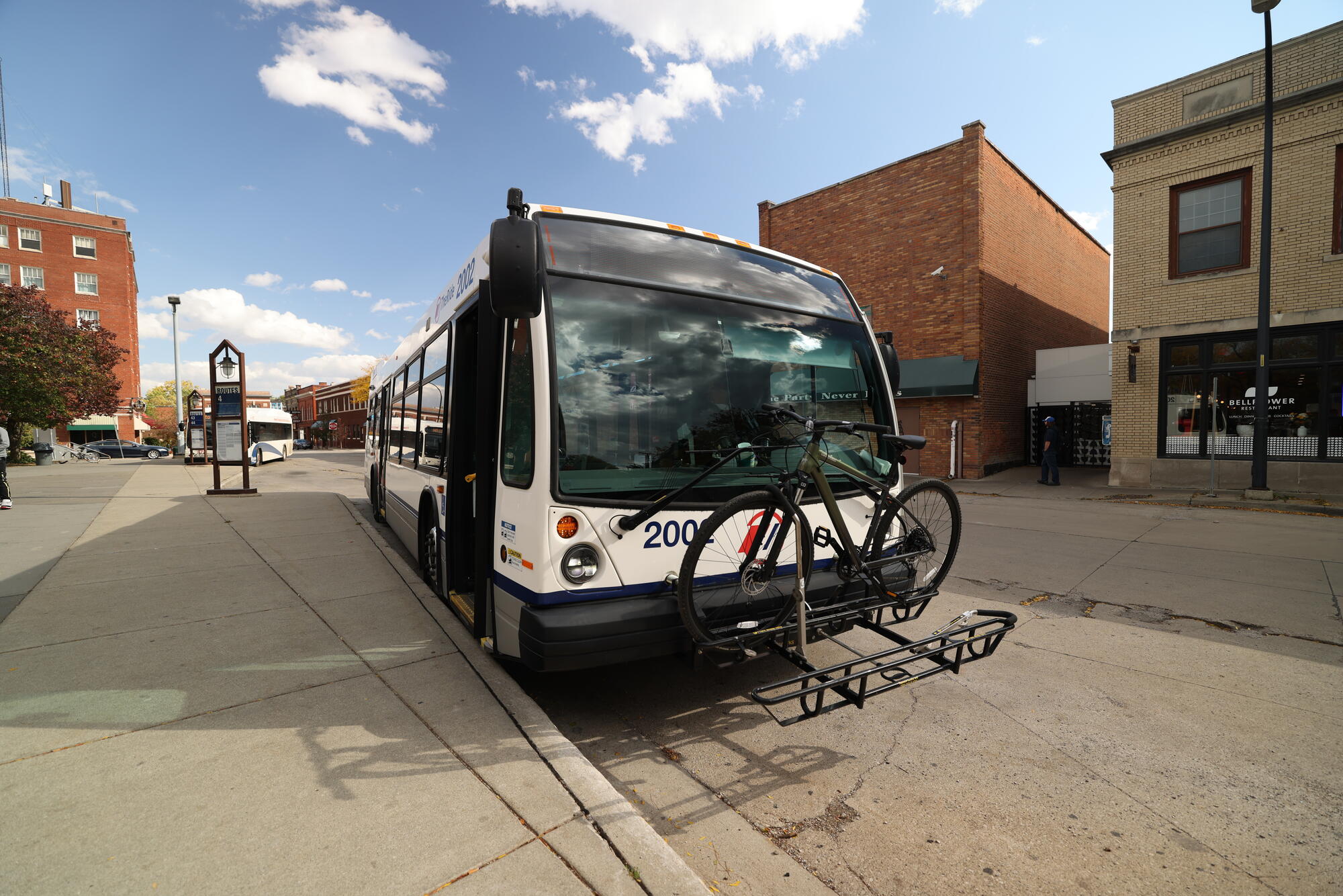 Bus with bike on front.