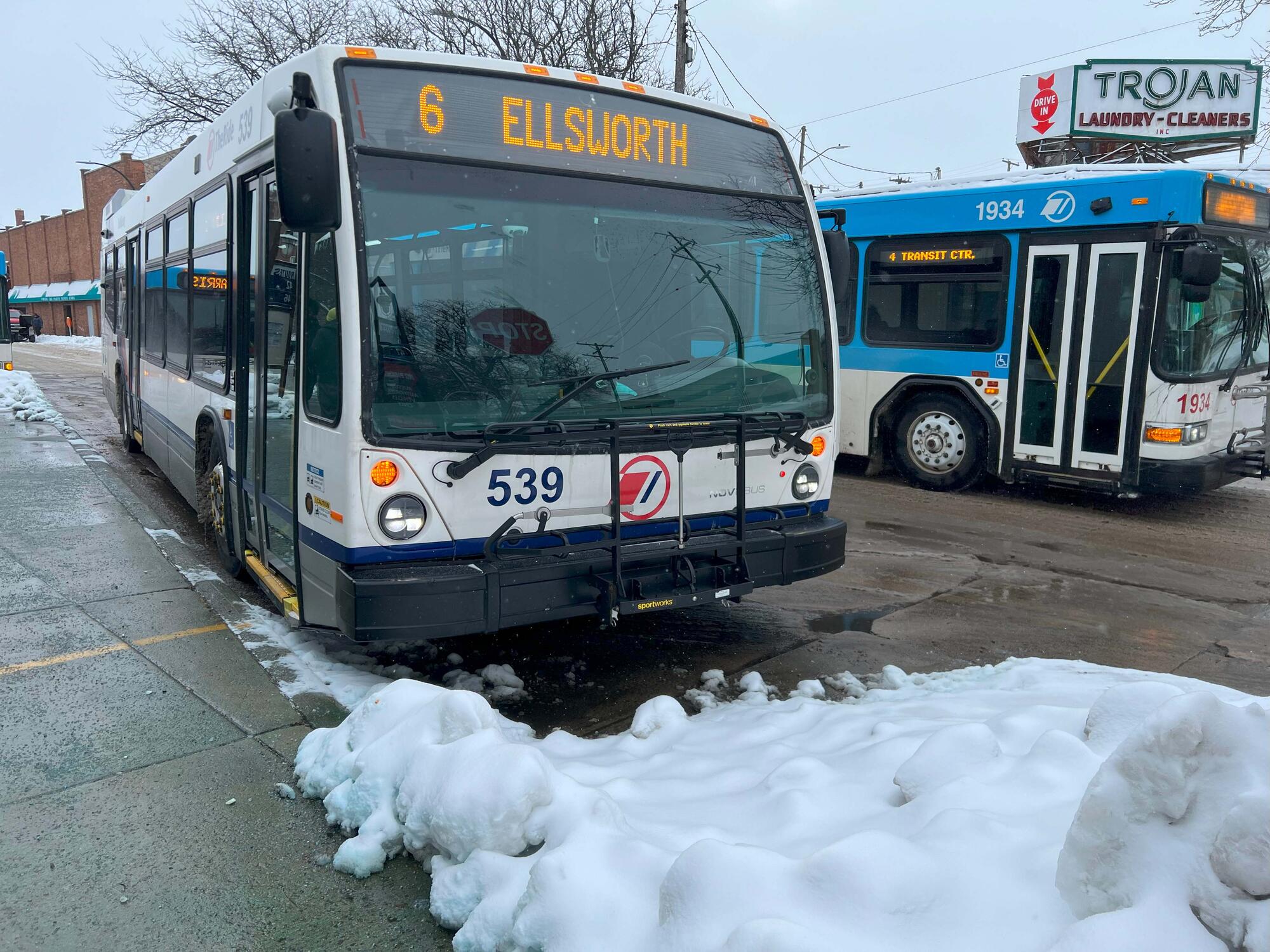 Image of a bus in the snow at the Ypsilanti Transit Center