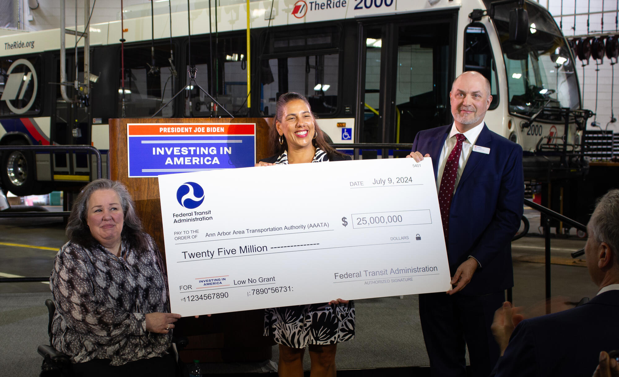 Photo of check being presented to TheRide
