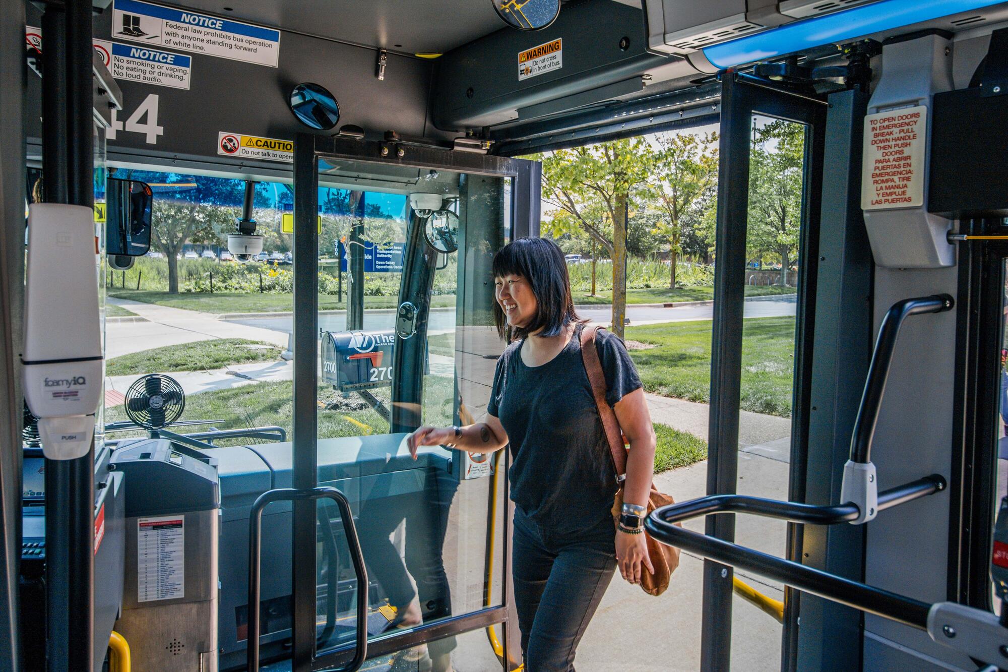 image of a person boarding a TheRide bus