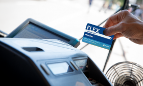 TheRide FlexPass being swiped through farebox