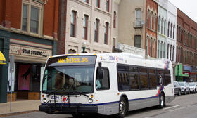 Bus driving on Michigan Ave in Ypsilanti