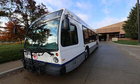 Bus parked in parking lot.