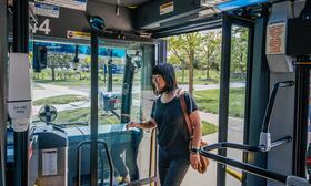 image of a person boarding a TheRide bus